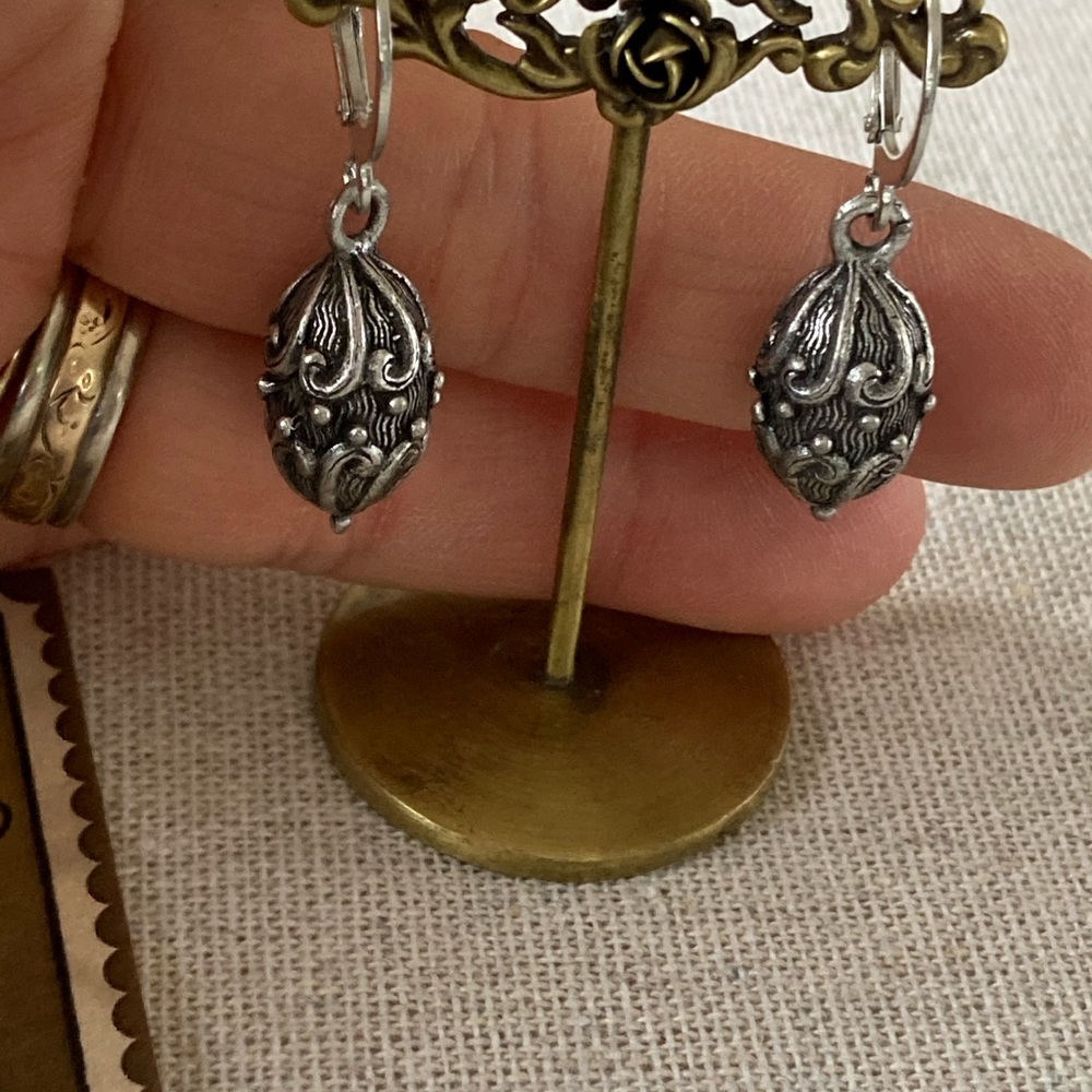 Silver Metal Oval Carved Bead Earrings - Picture 2 of 3